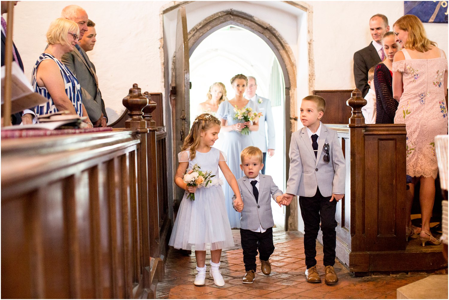 bridesmaids and flower girl at st.mary's church stansted kent