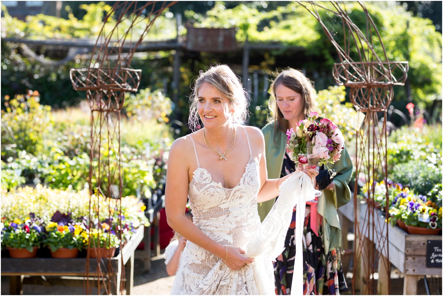 bride arrives at reception hosted by Petersham Nurseries in Richmond